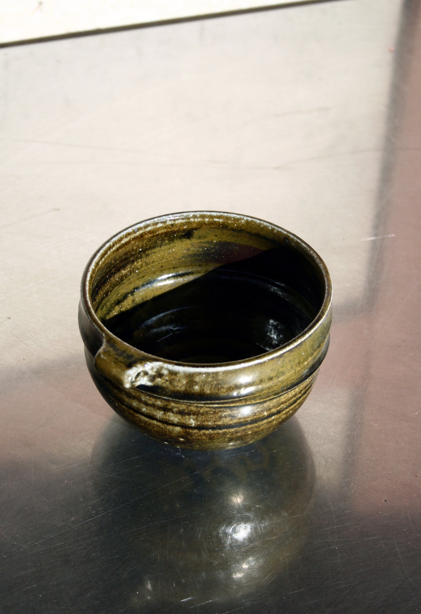 Bowl with pierced lug