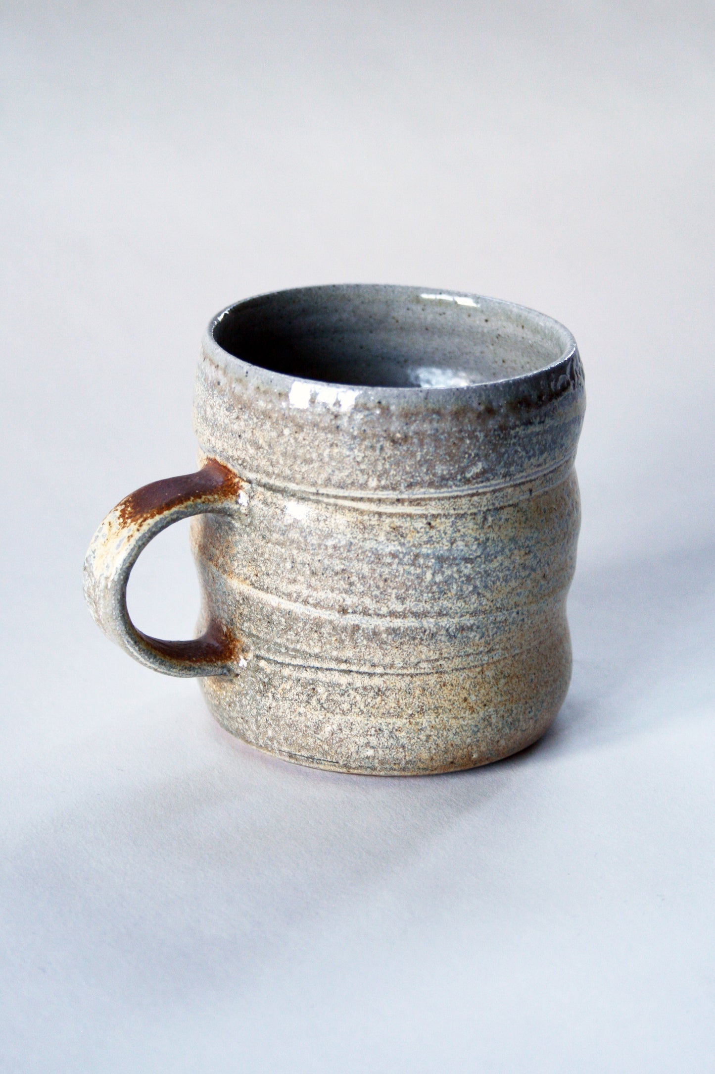 Salt glaze coffee mug in CY slip