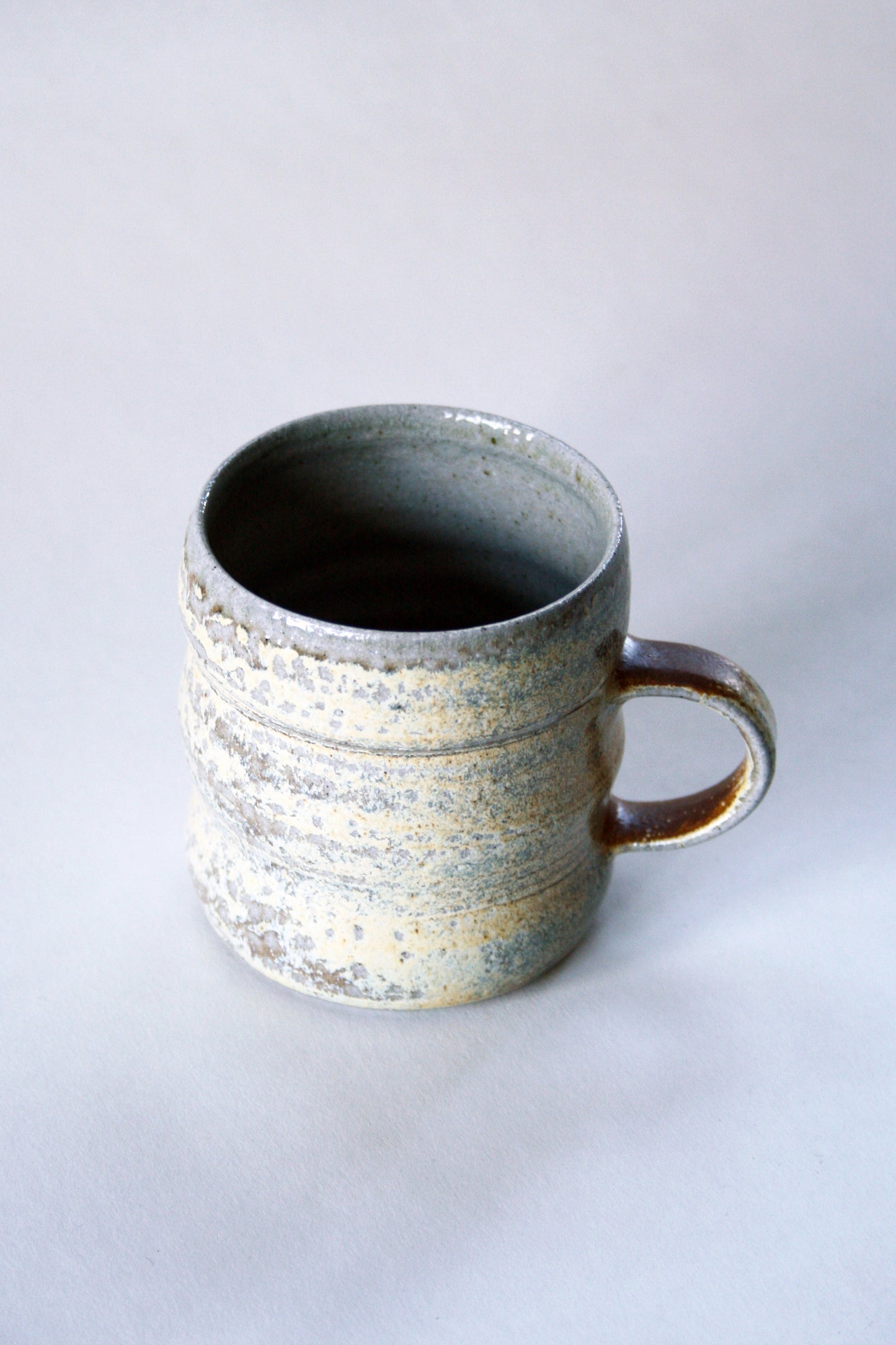 Salt glaze coffee mug in CY slip