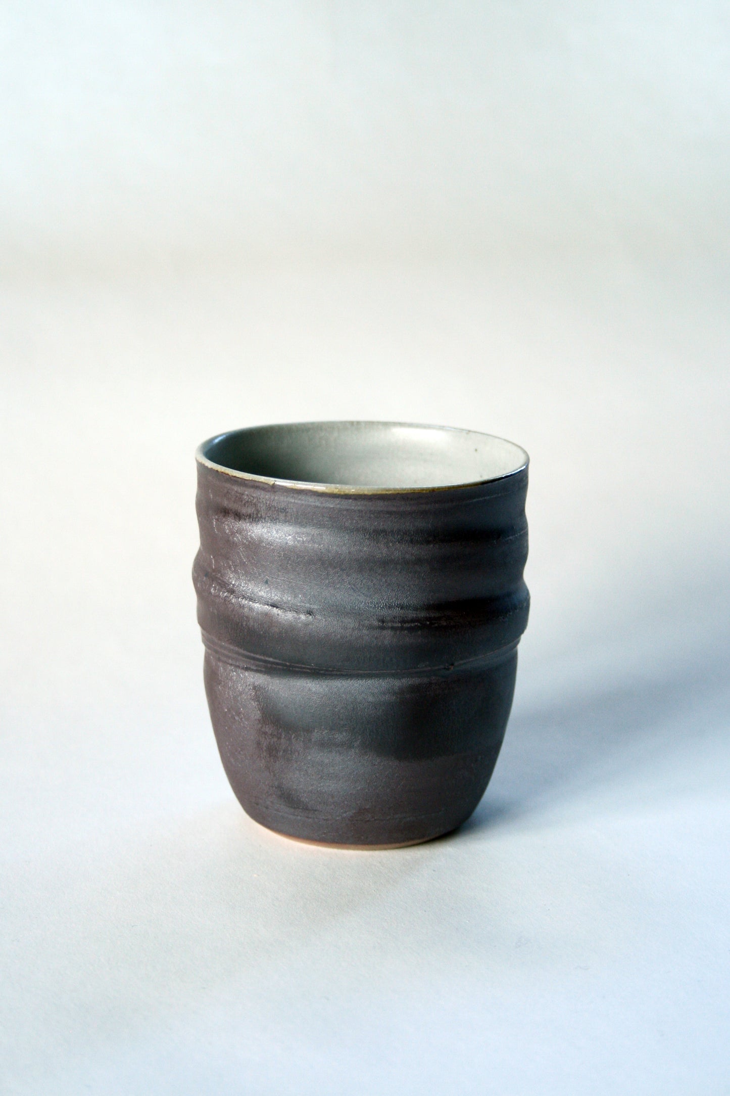Salt glaze iron slip tumbler