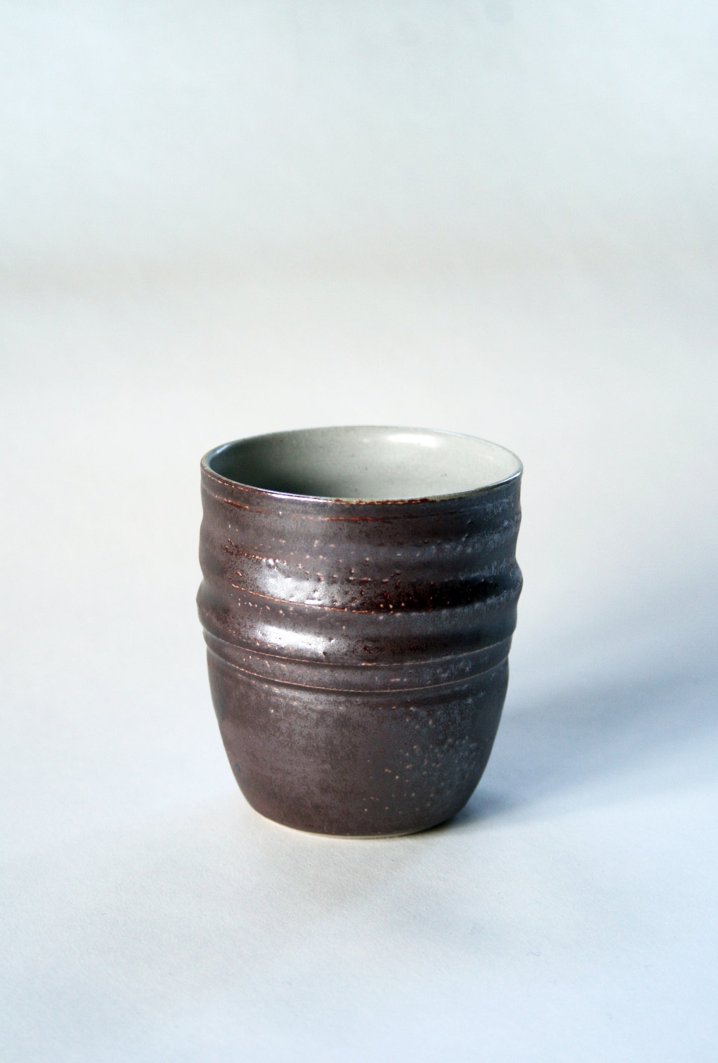 Salt glaze iron slip tumbler