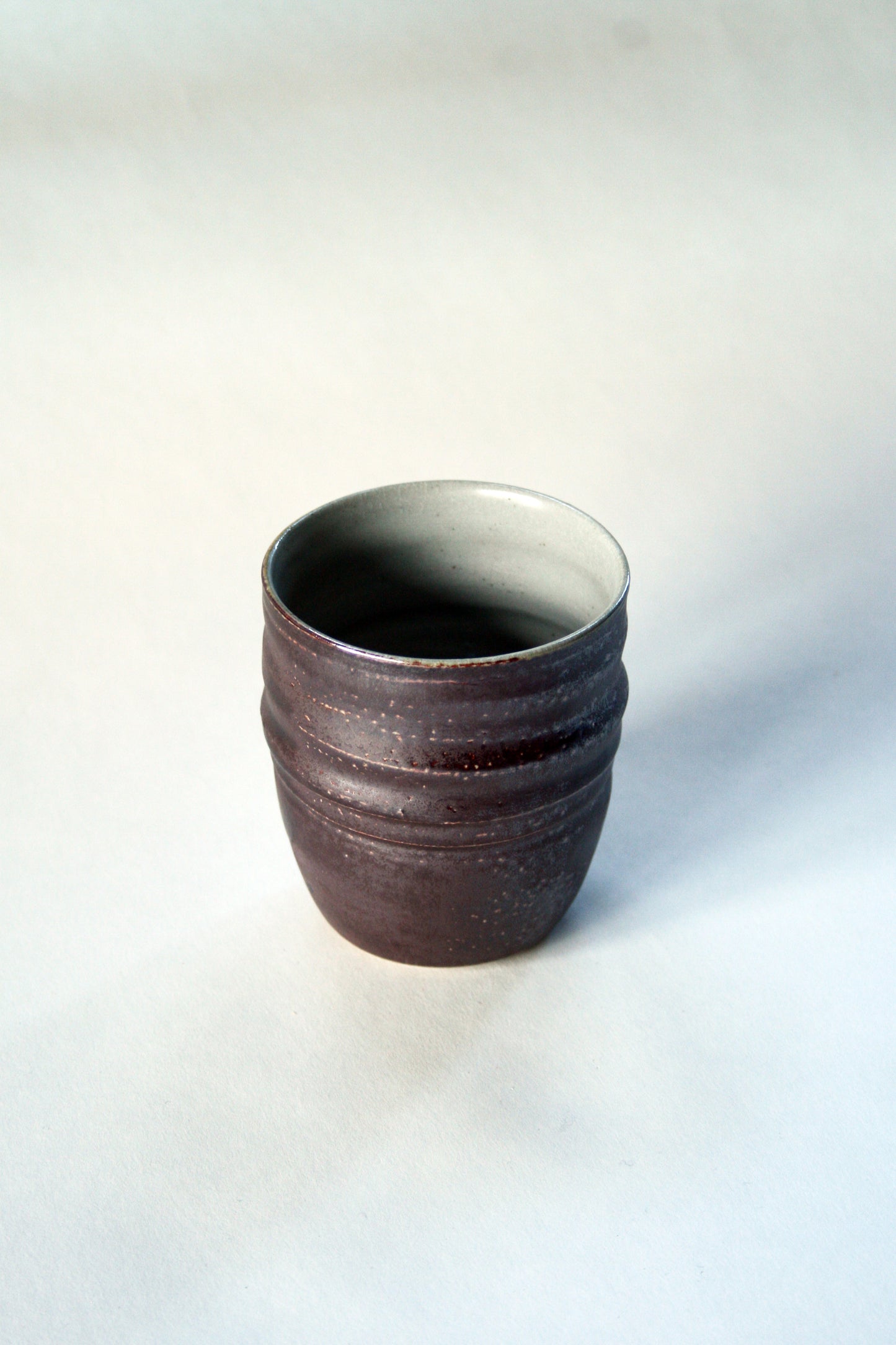 Salt glaze iron slip tumbler