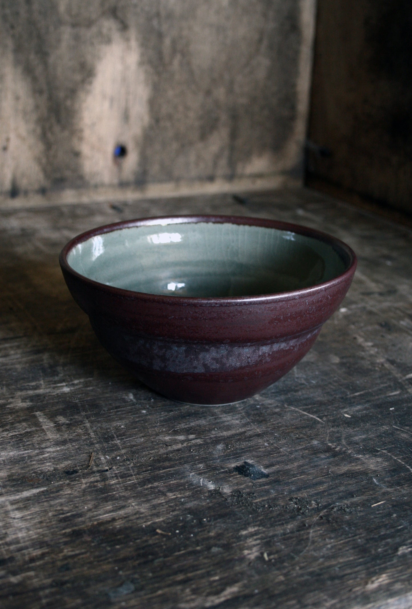 Iron slip and green celadon cereal bowl