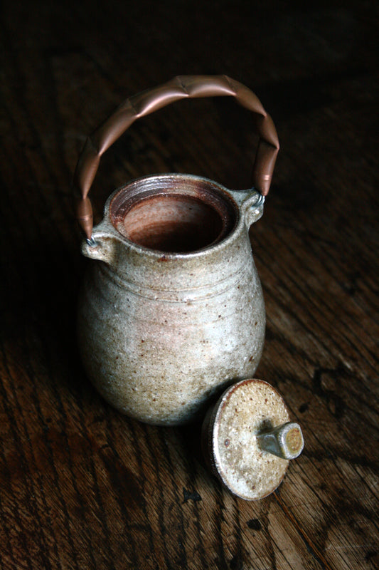 Caddy with copper handle