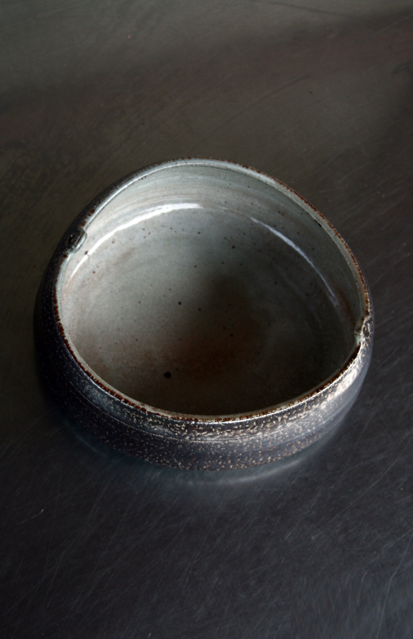 Asymmetric dish with lugs