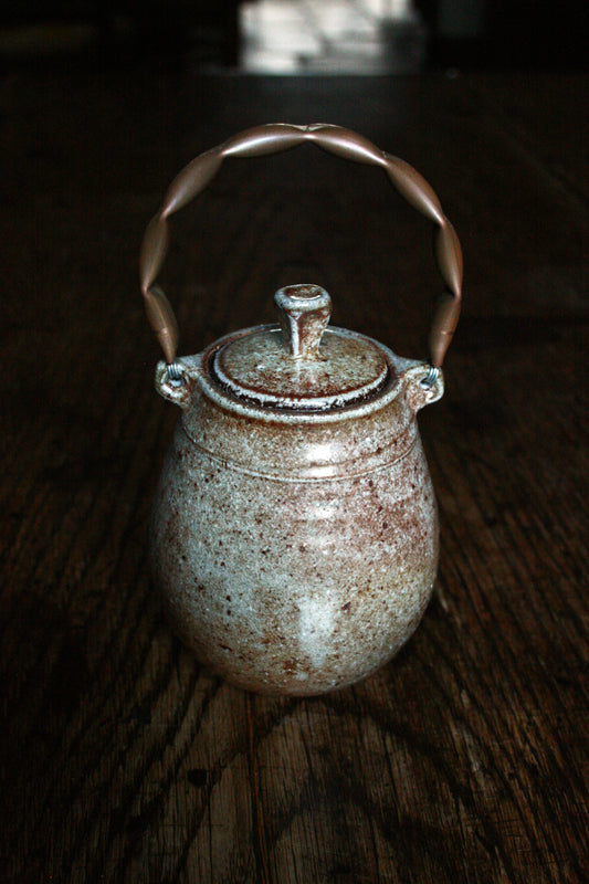 Caddy with copper handle