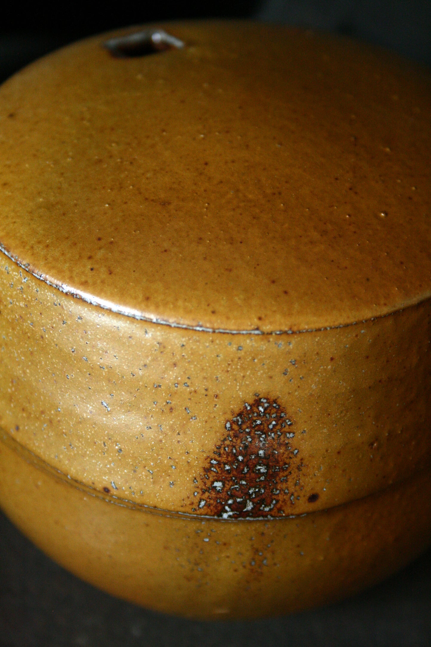 Enclosed form vase with square opening