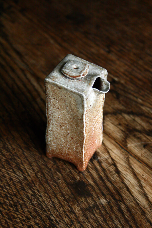 Slab built soy pourer