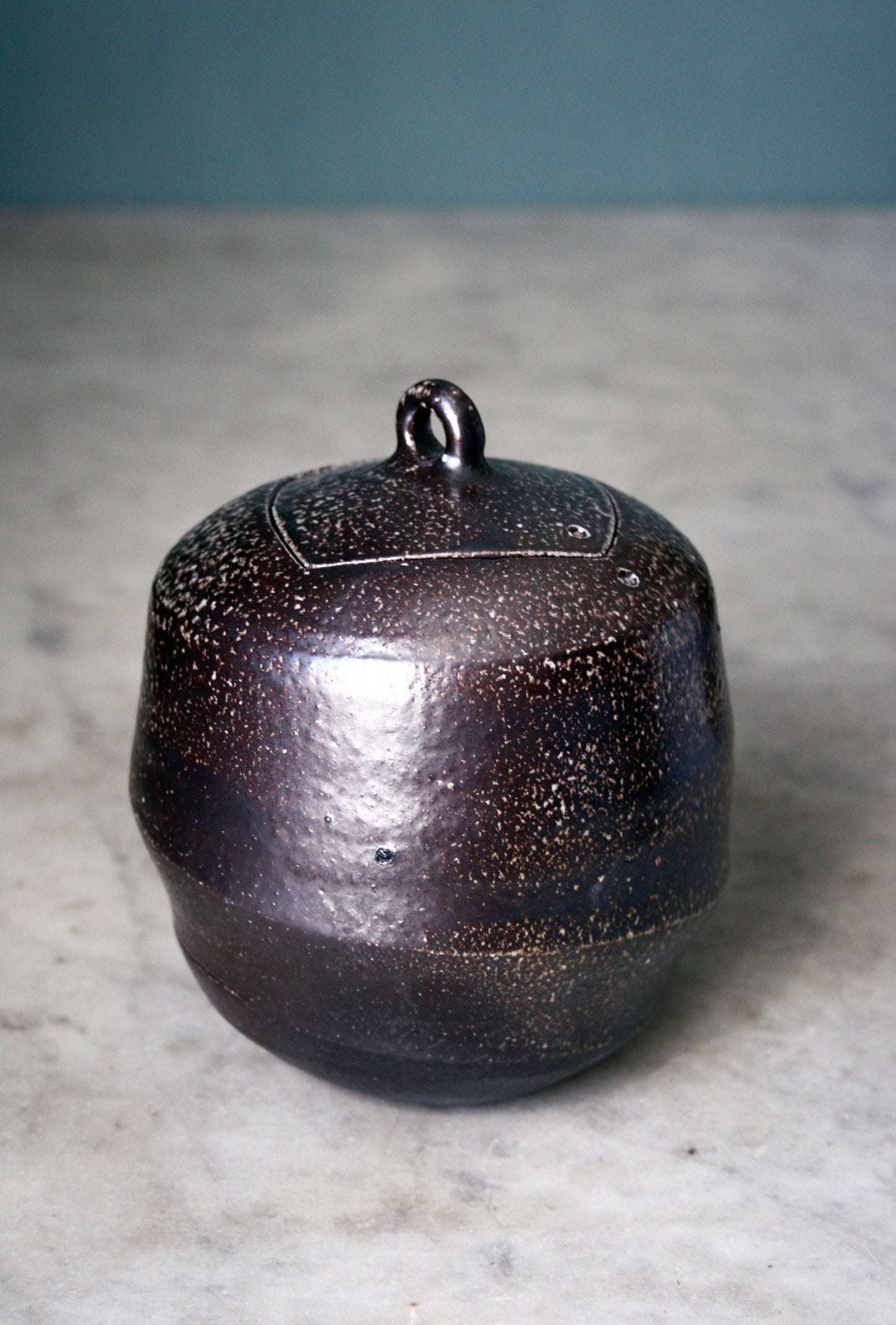 Jar with carved lid