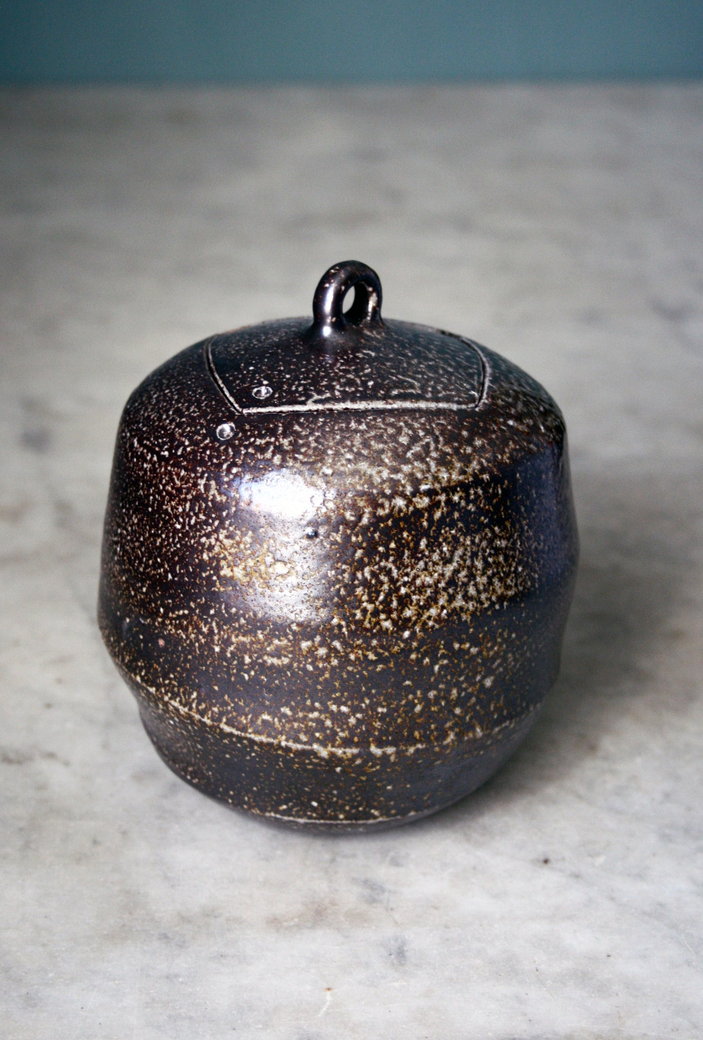 Jar with carved lid