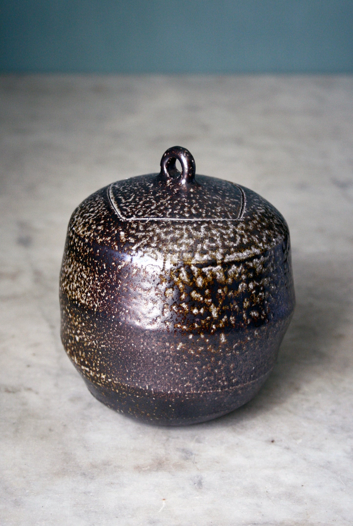 Jar with carved lid