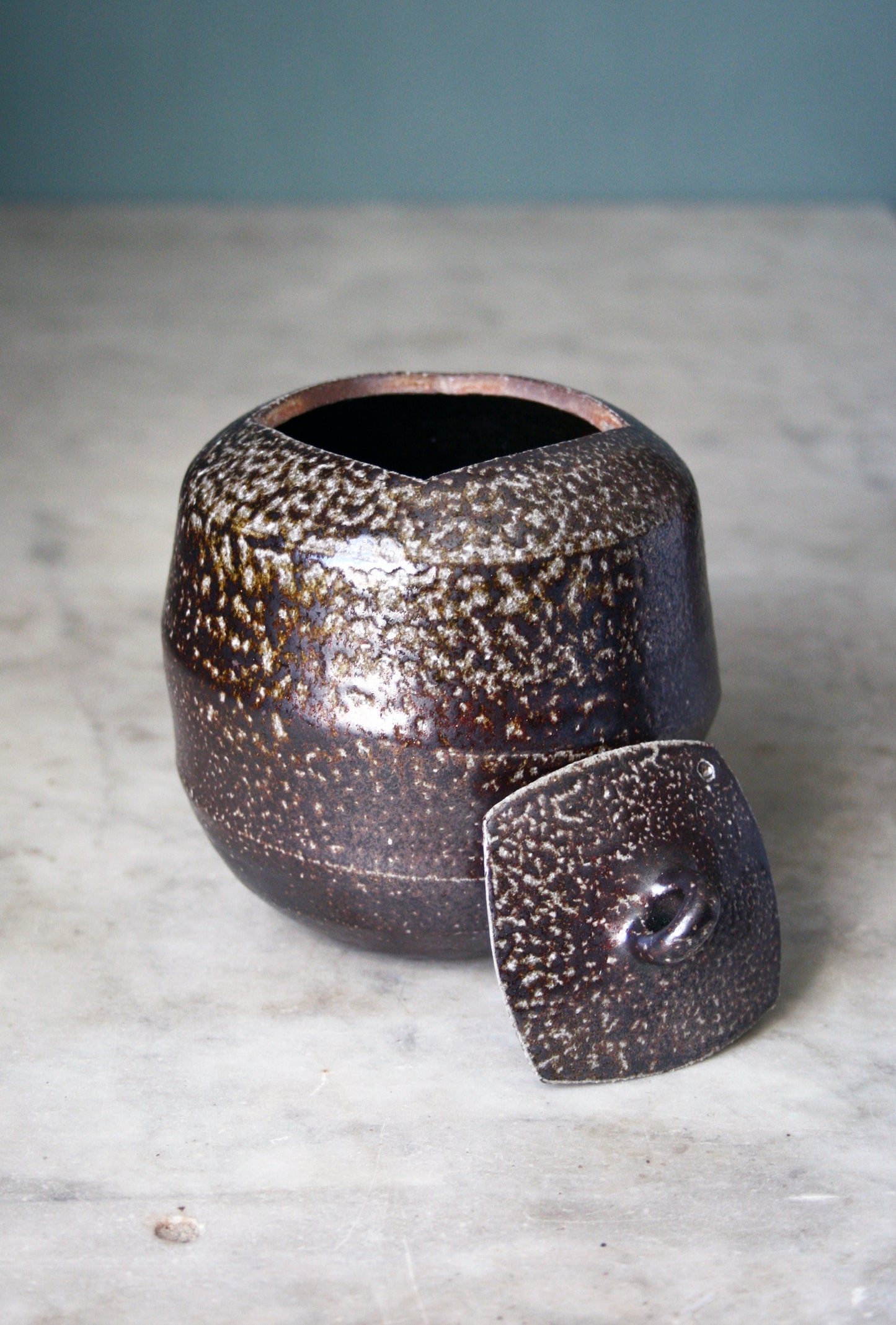 Jar with carved lid