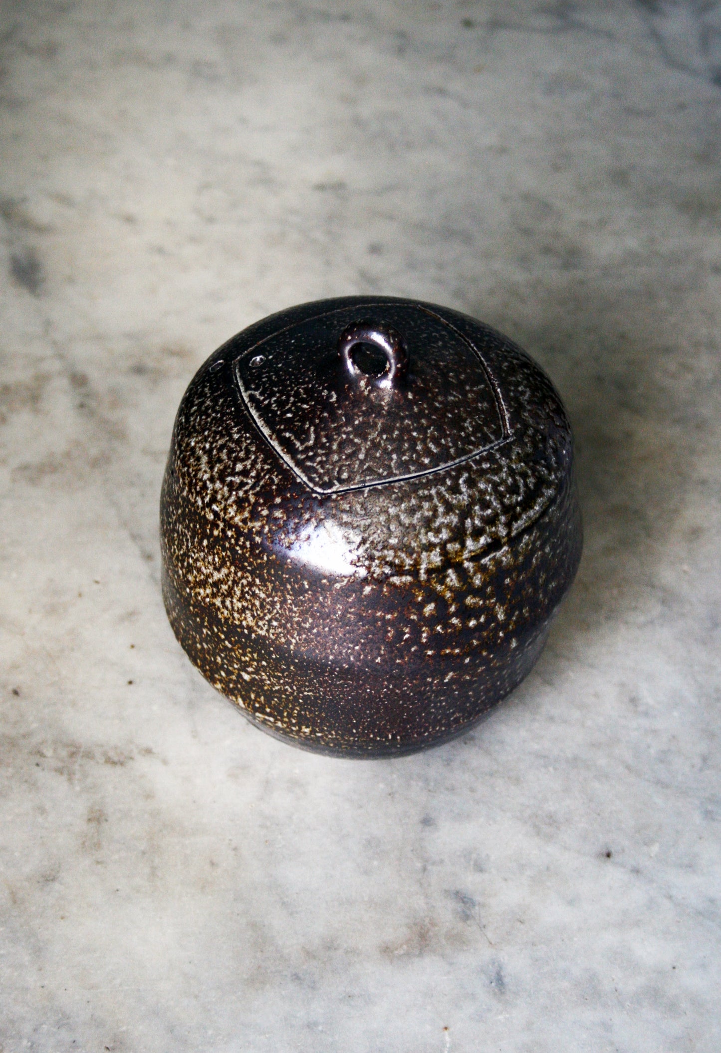 Jar with carved lid