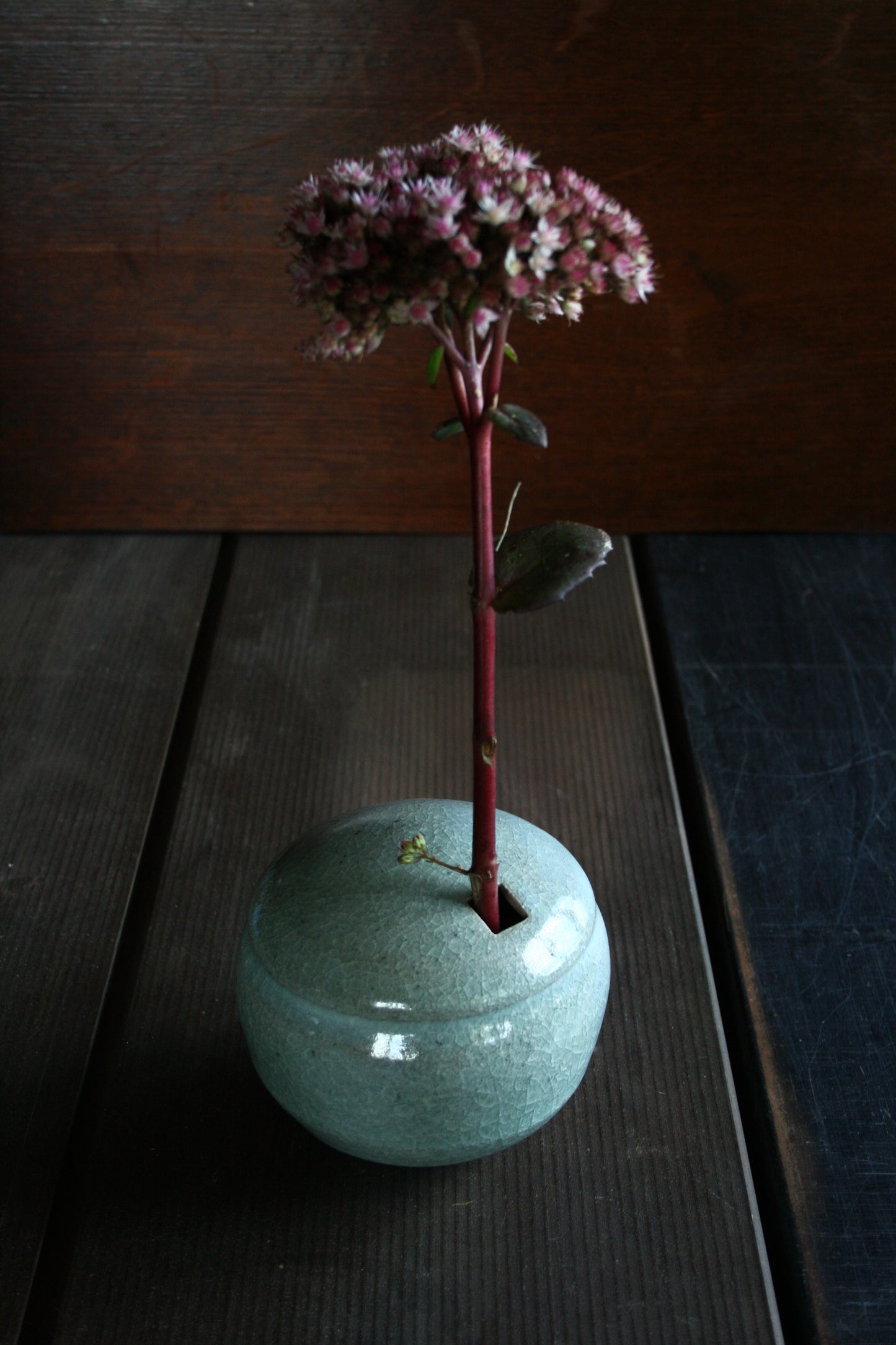 Enclosed form vase