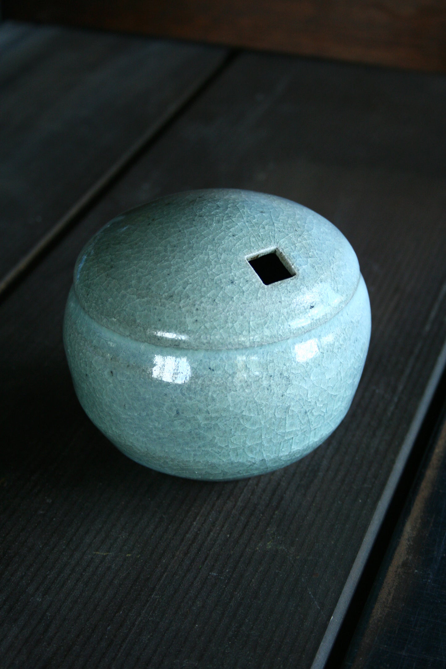 Enclosed form vase