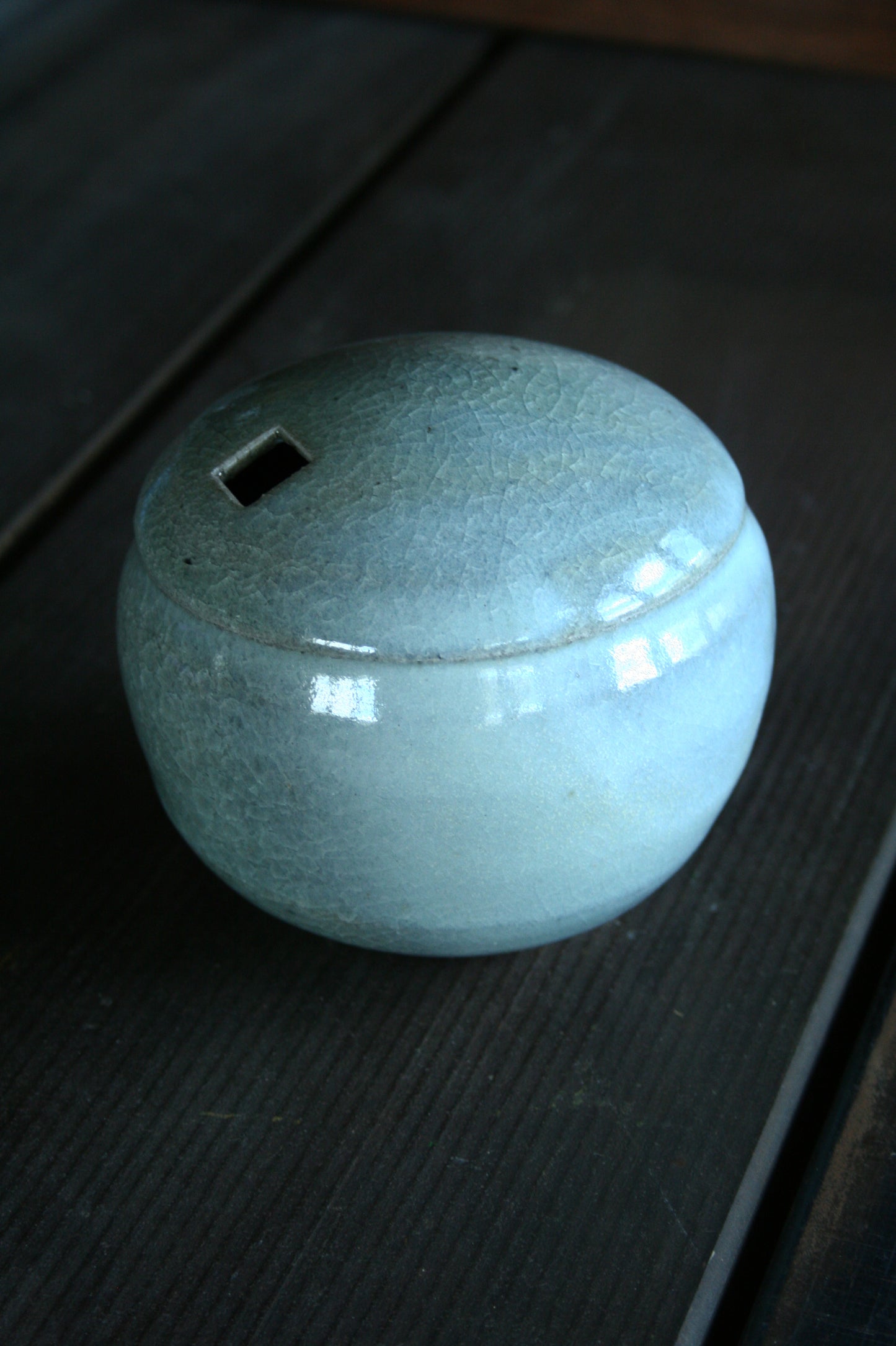 Enclosed form vase