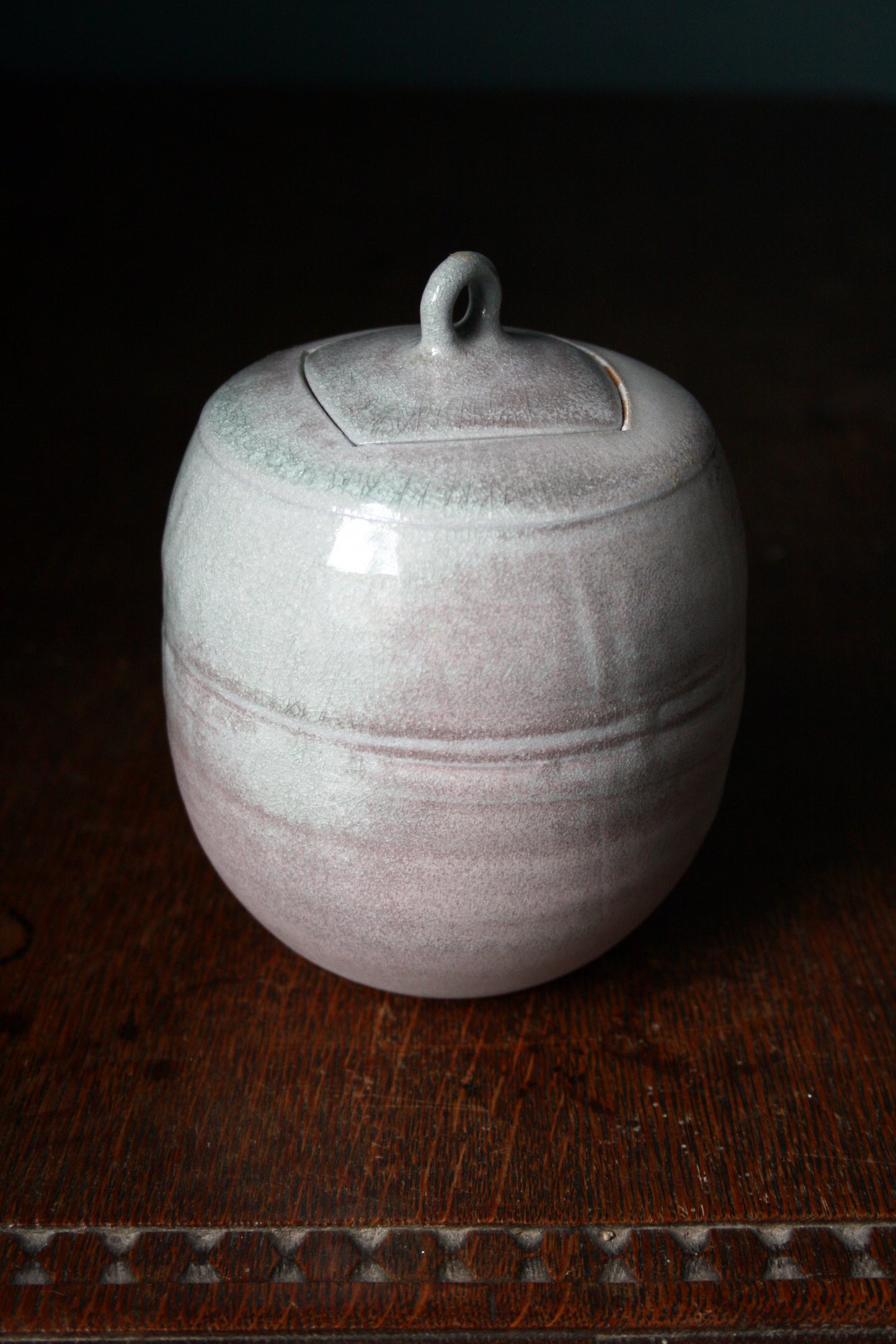 Jar with carved lid