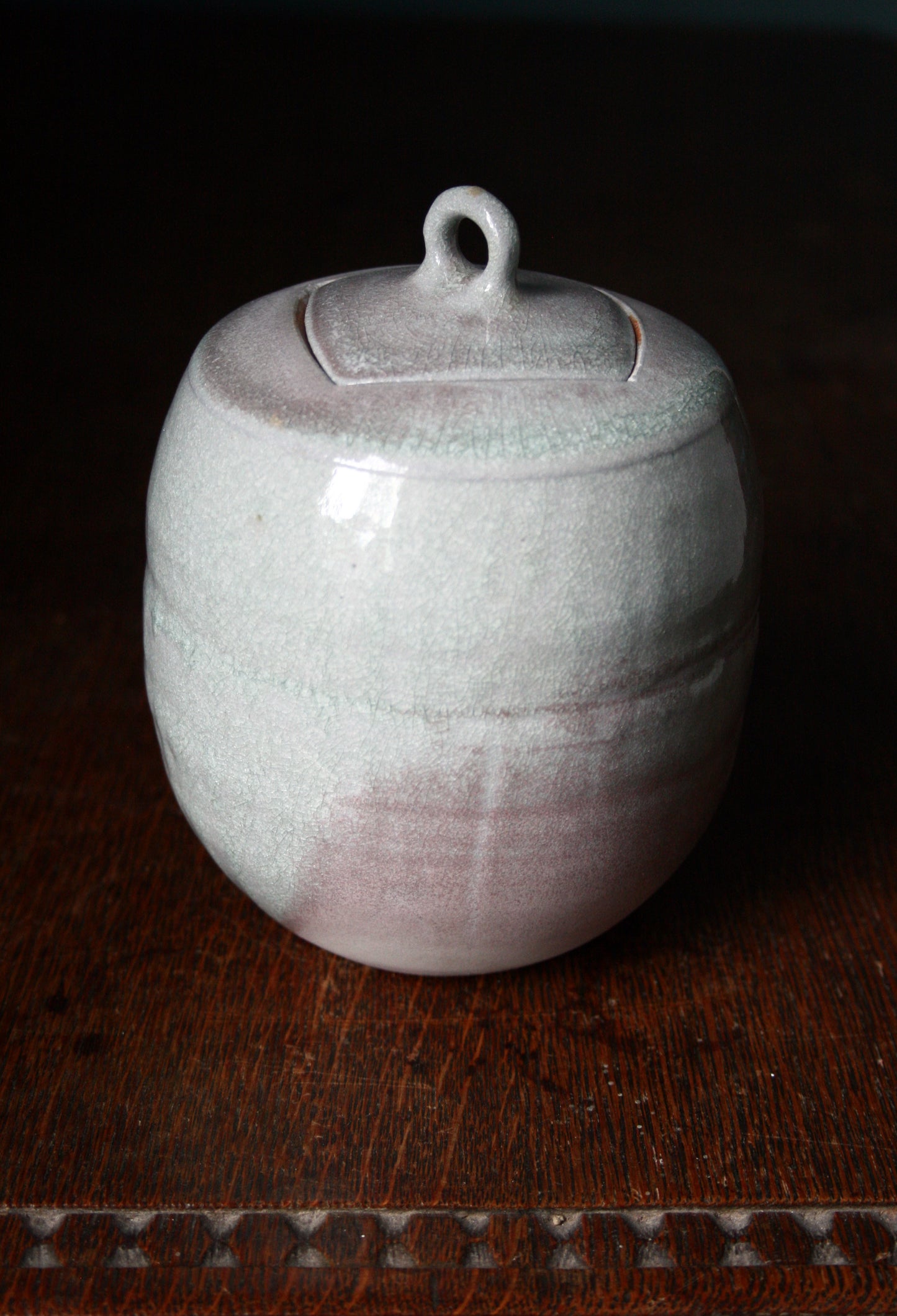 Jar with carved lid