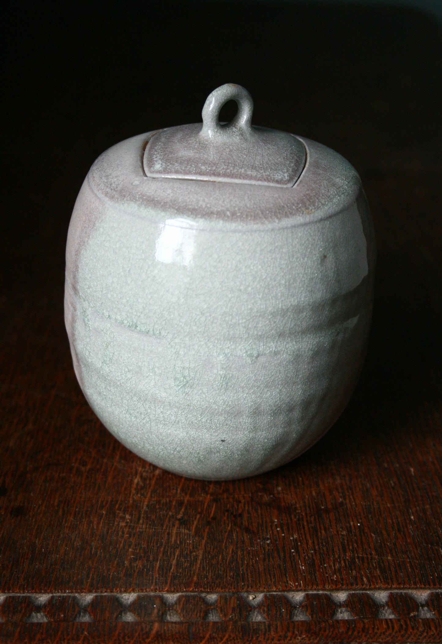 Jar with carved lid