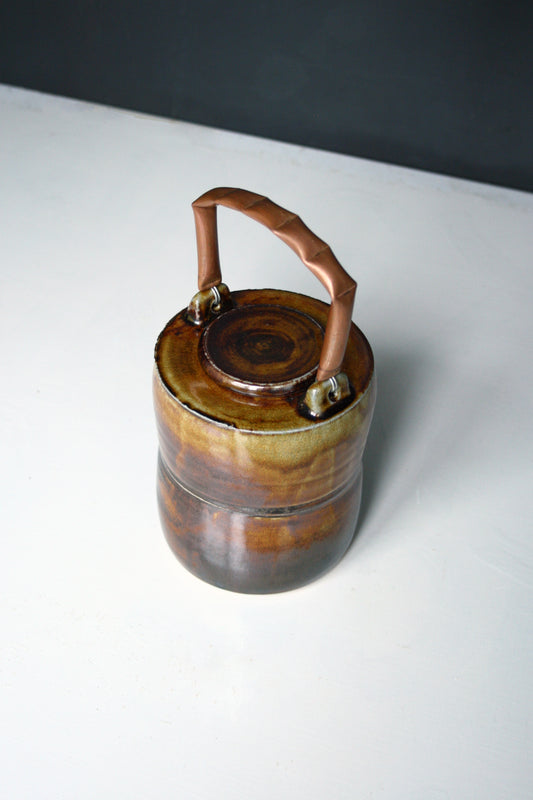 Jar with copper handle