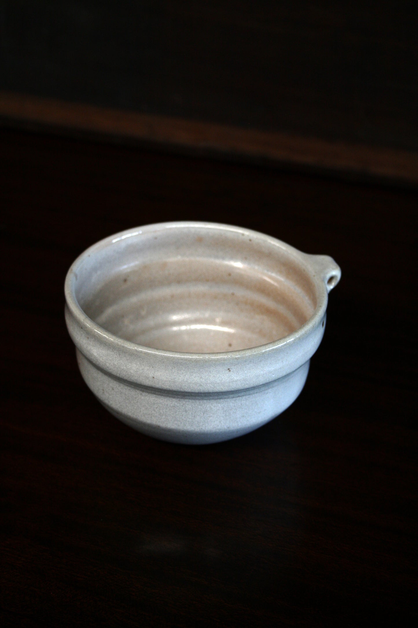 Shino bowl with pierced lug