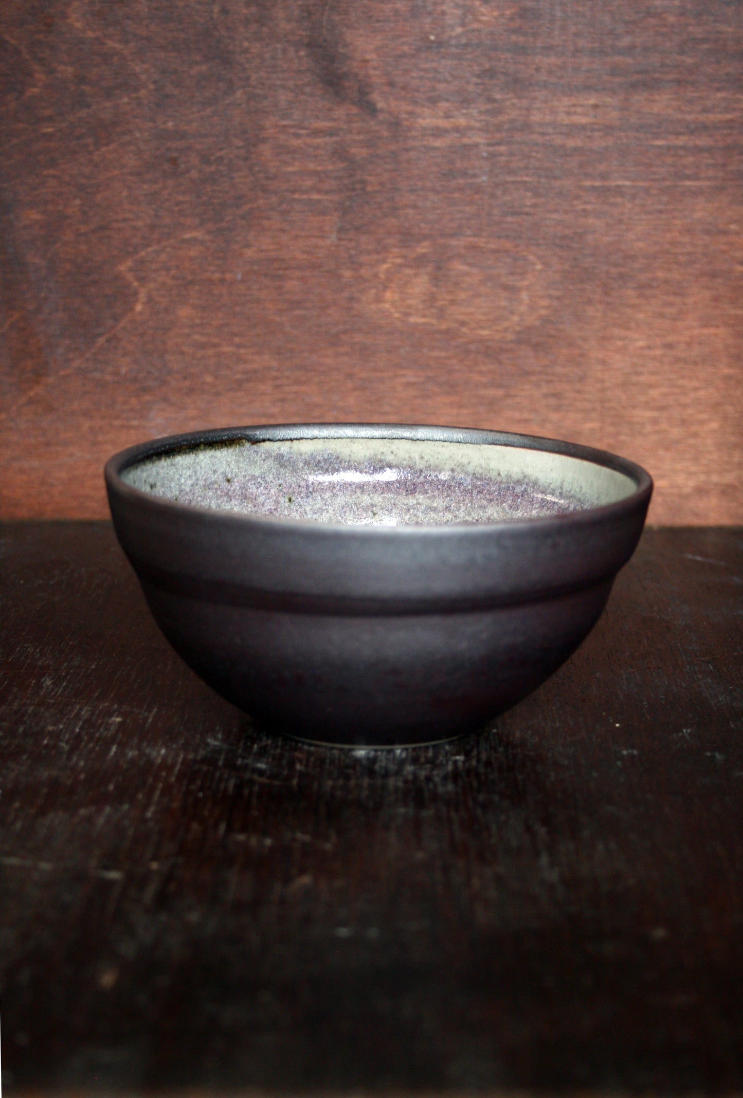 Cereal bowl with black slip and ash glaze interior