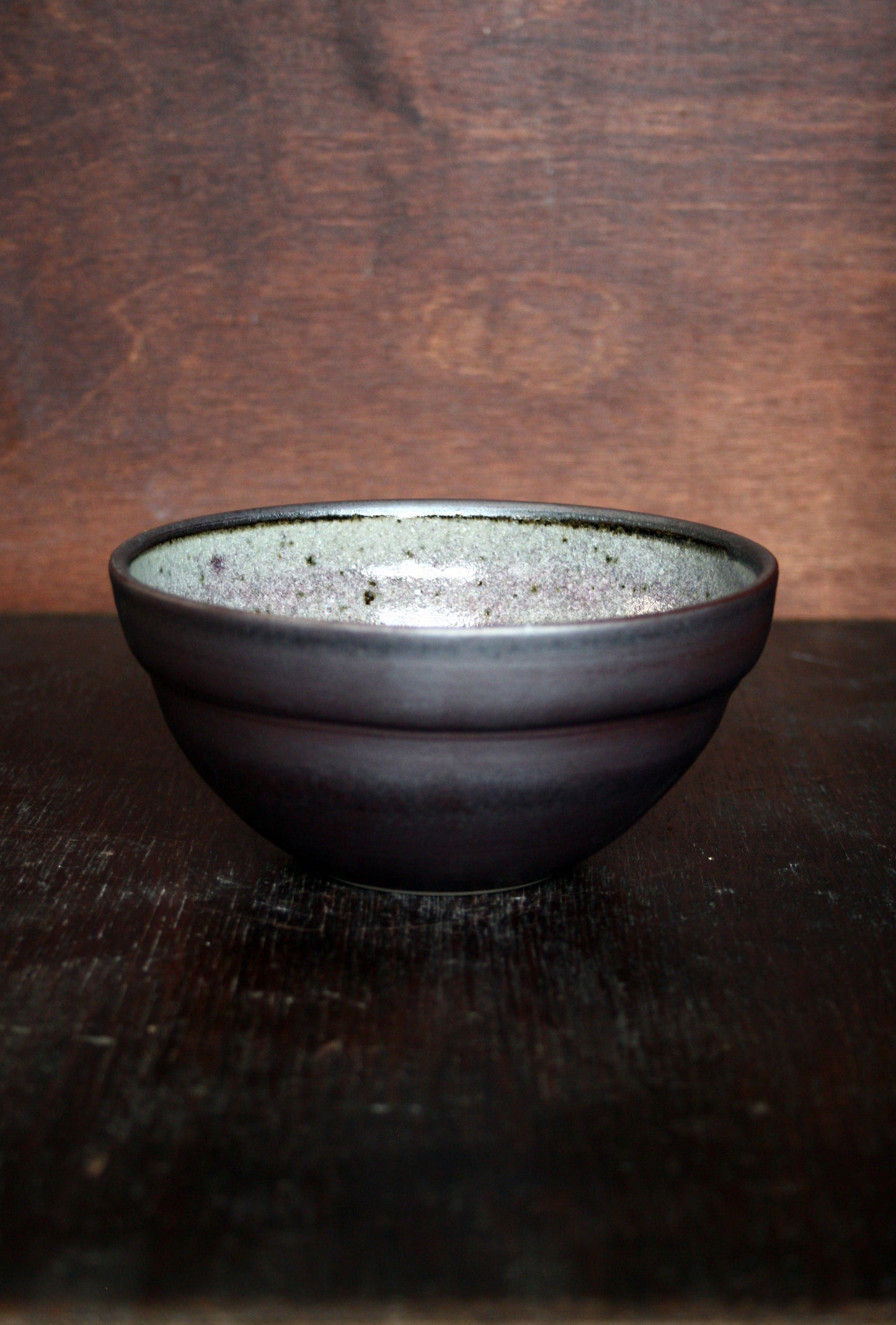 Cereal bowl with black slip and ash glaze interior