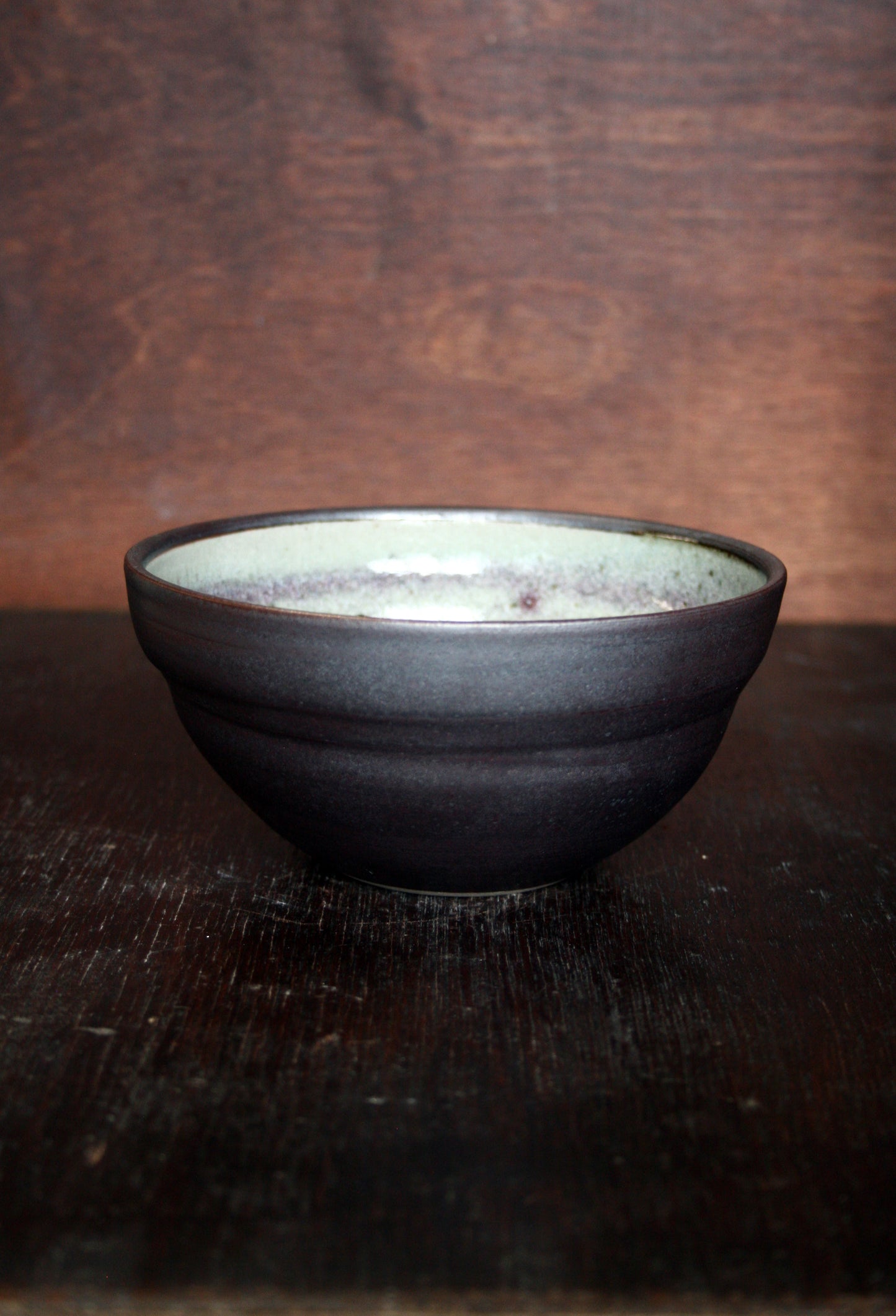 Cereal bowl with black slip and ash glaze interior