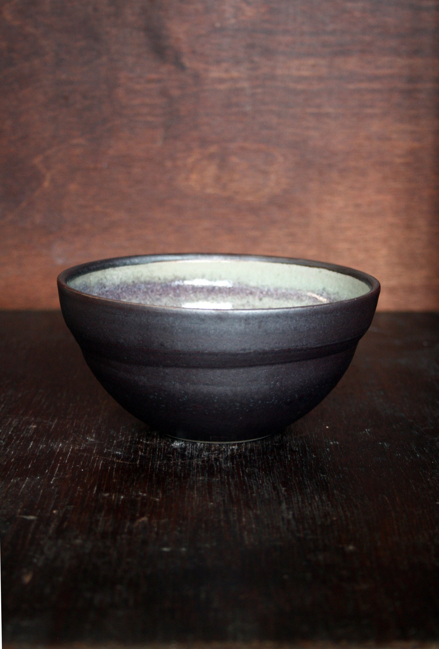 Cereal bowl with black slip and ash glaze interior