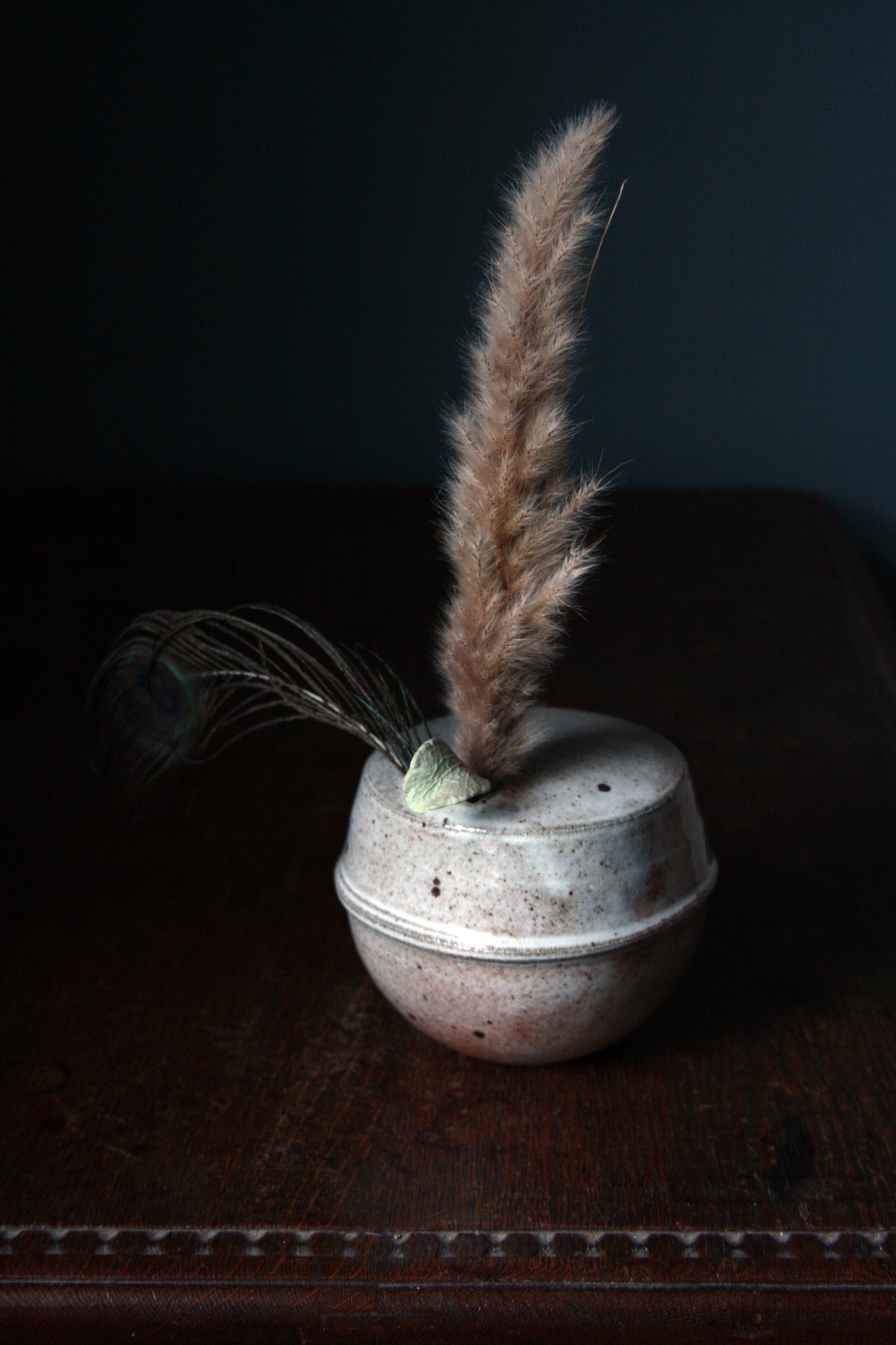Enclosed form vase