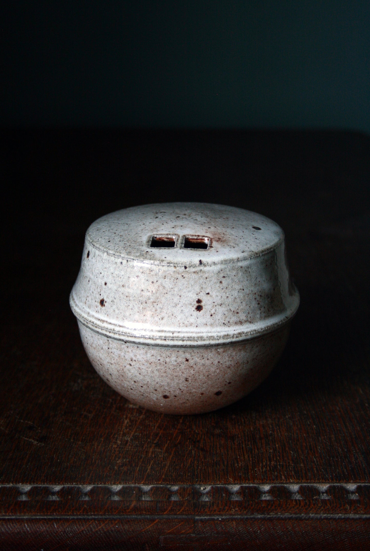Enclosed form vase