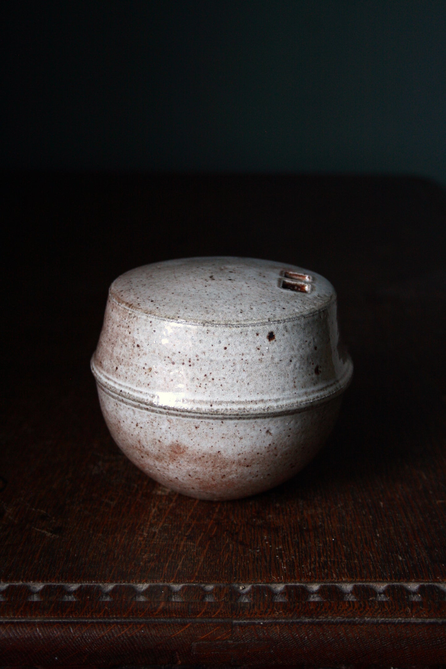 Enclosed form vase