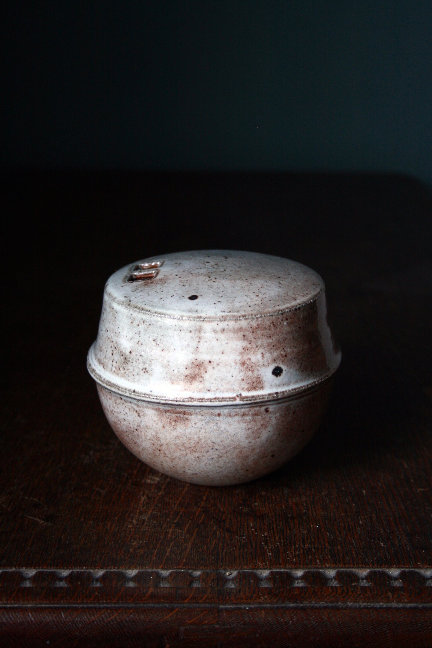 Enclosed form vase
