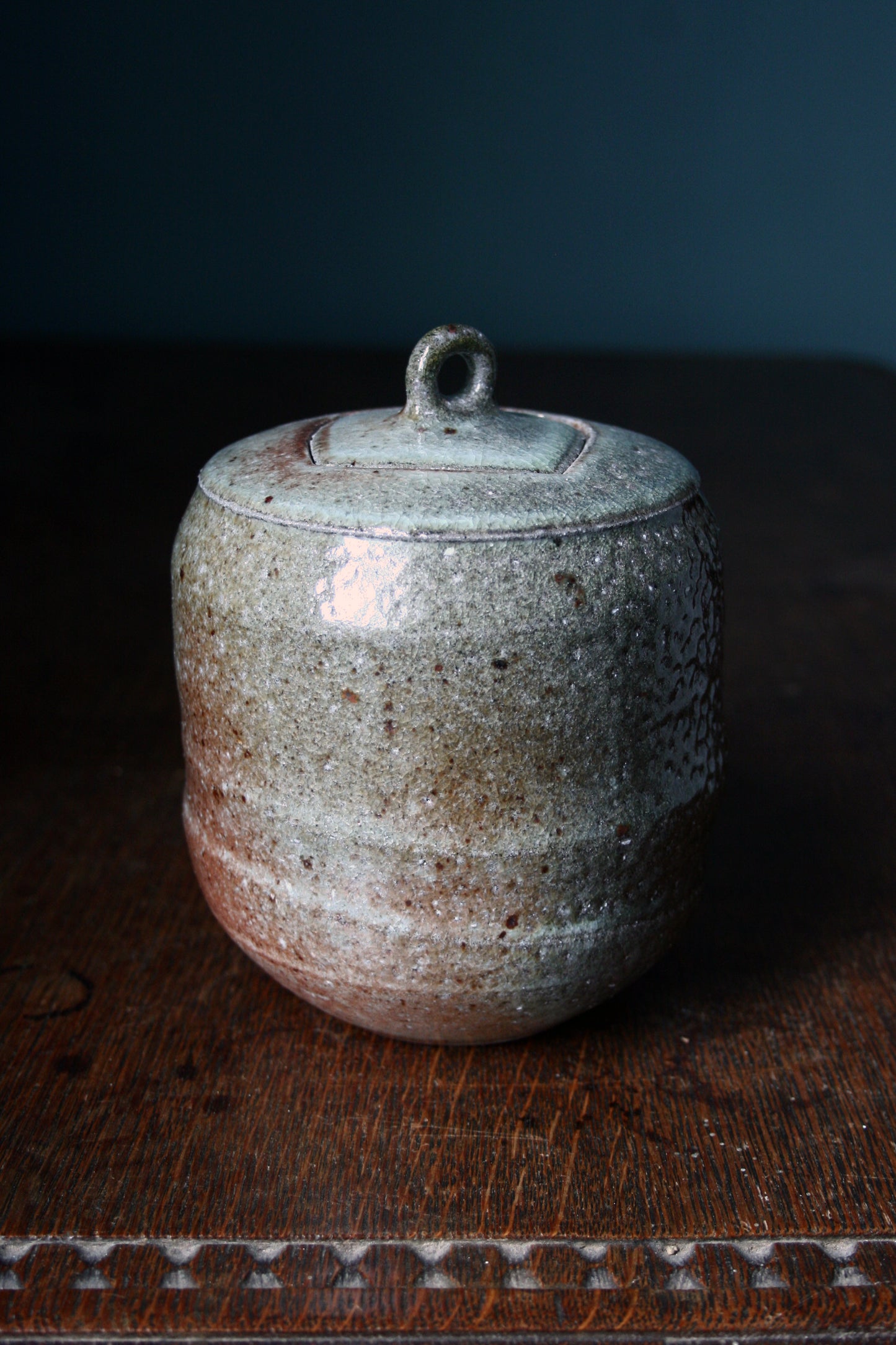 Jar with carved lid