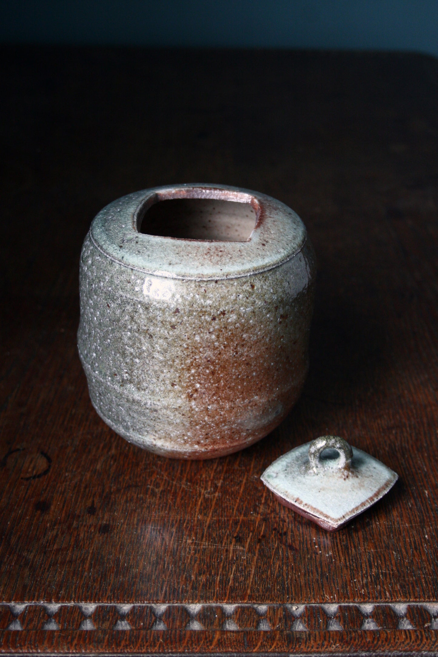 Jar with carved lid