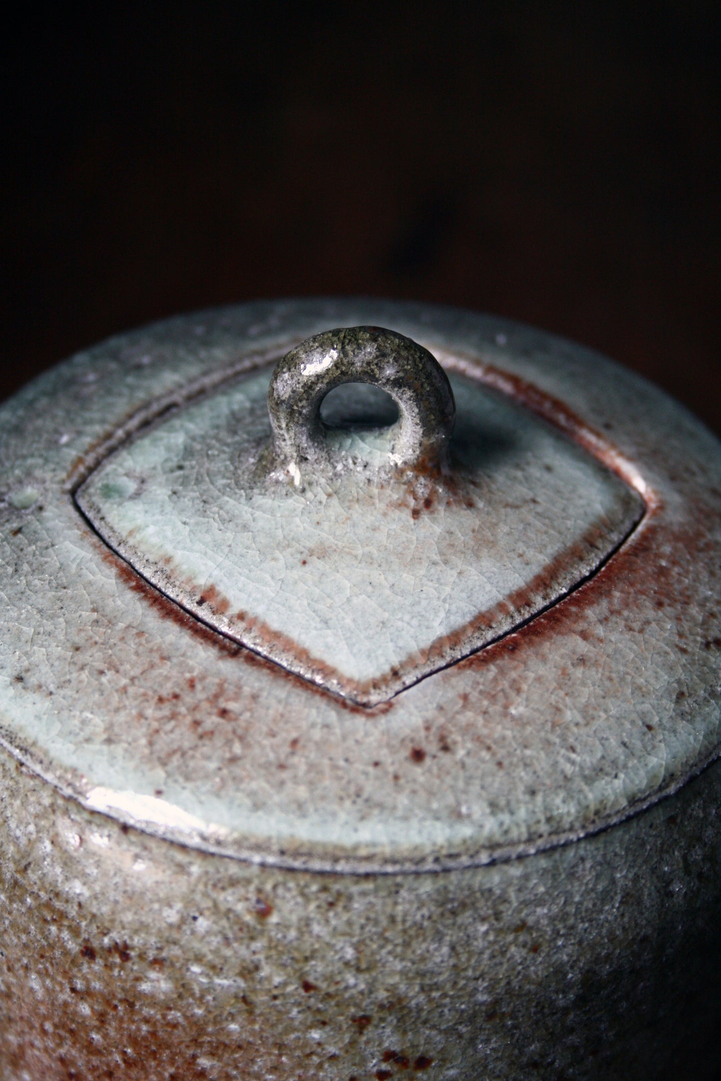 Jar with carved lid