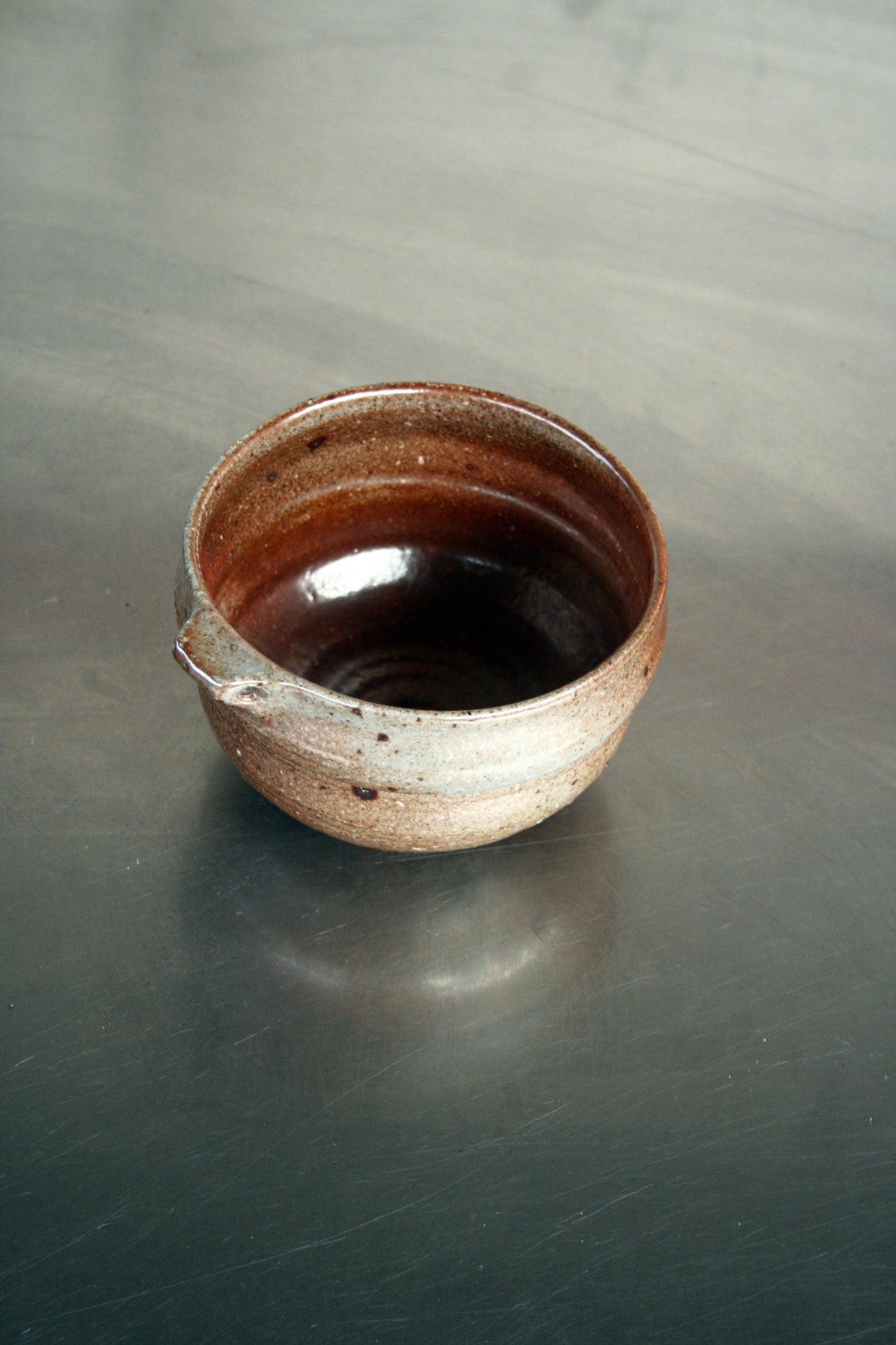 Bowl with pierced lug
