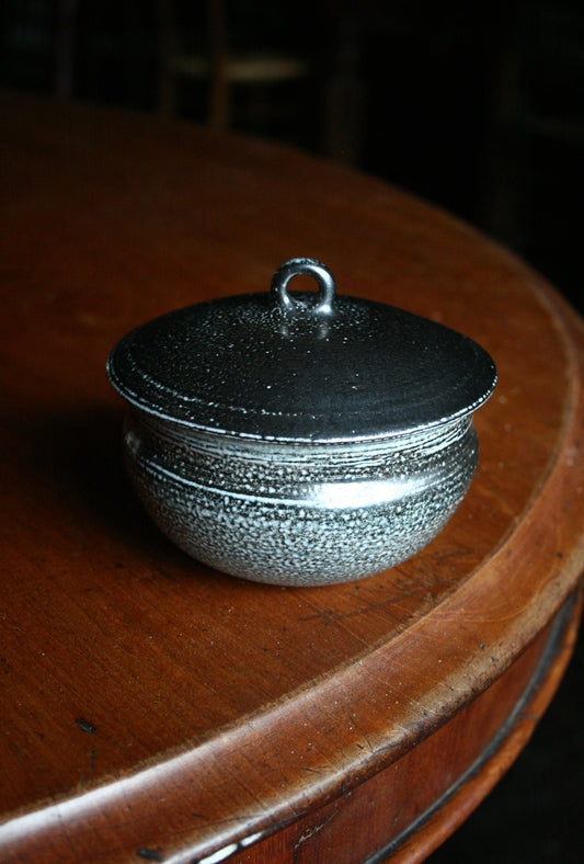 Lidded jar with loop handle