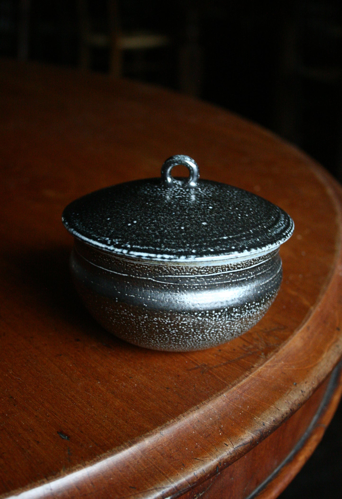 Lidded jar with loop handle