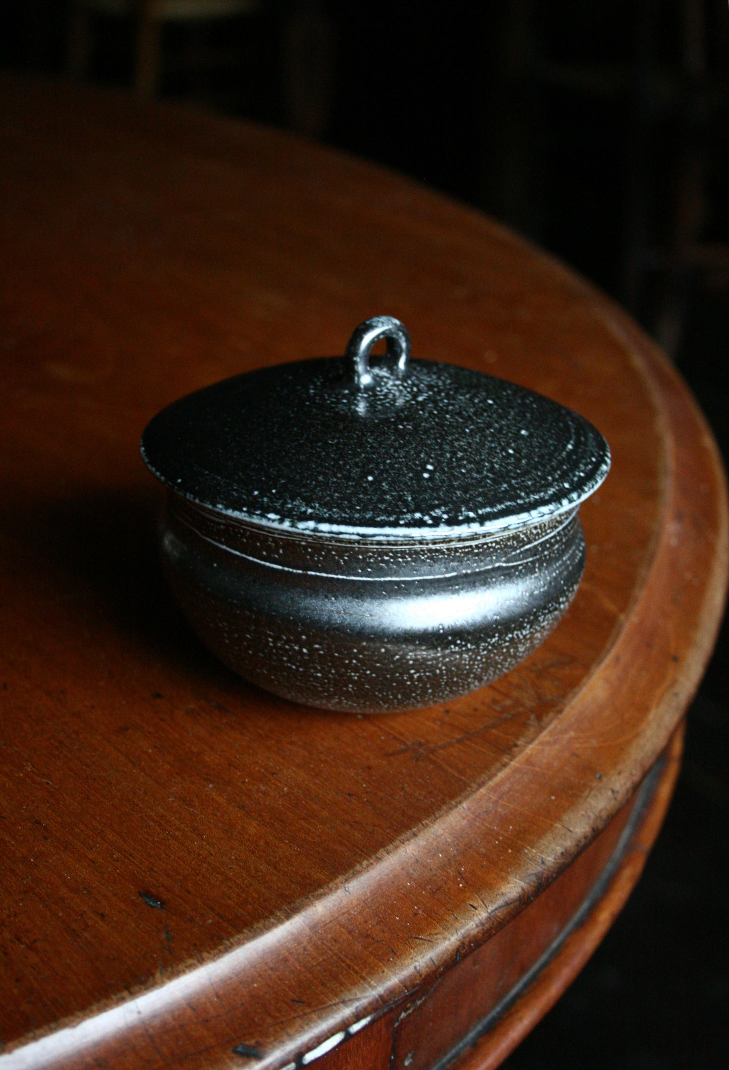 Lidded jar with loop handle