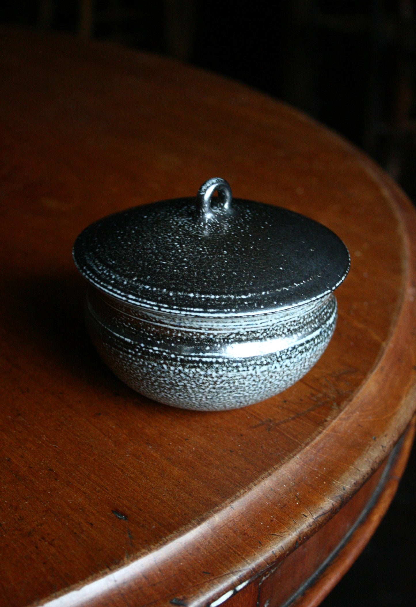 Lidded jar with loop handle