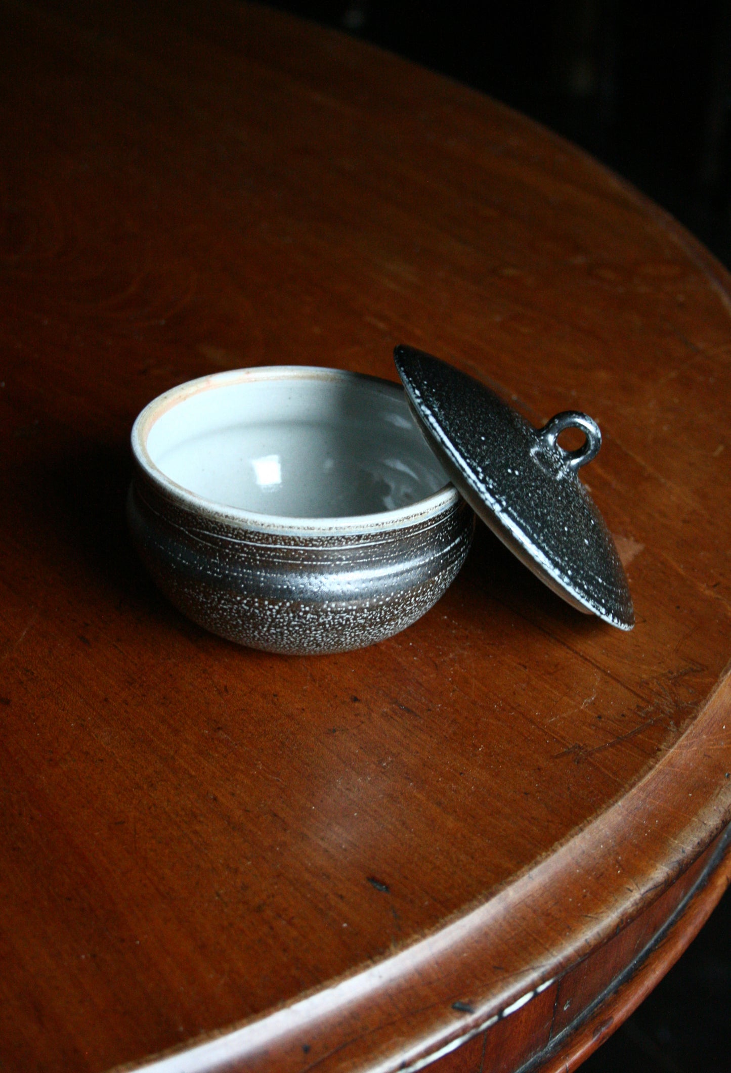 Lidded jar with loop handle