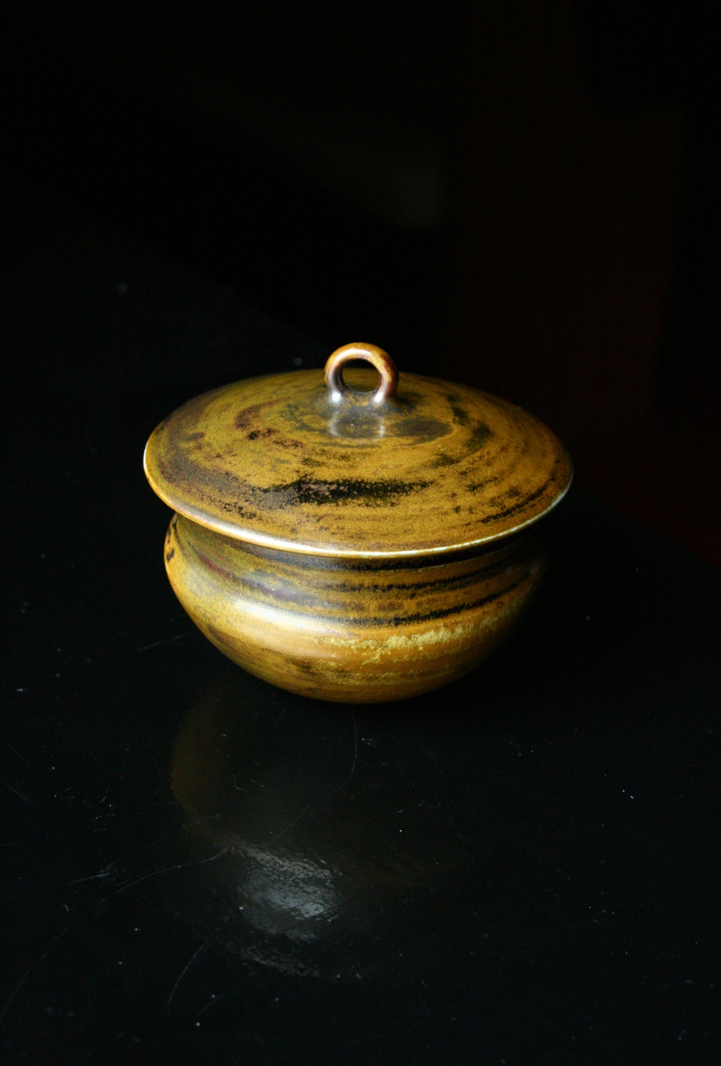 Lidded jar with loop handle