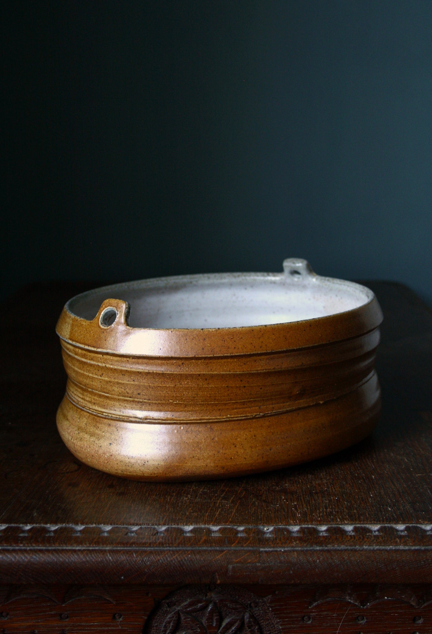 Asymmetric dish